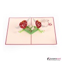 Zwei beflügelte Herzchen mit Blumen - Kartenfarbe Rot - 15 x 20 cm