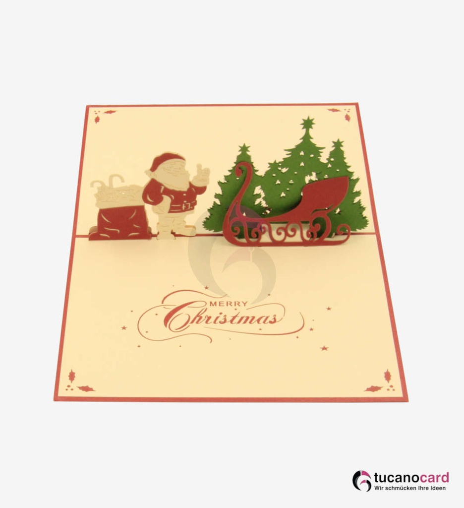 Weihnachtsmann mit Tannenbaum und Schlitten - Kartenfarbe Rot - 12 x 17 cm