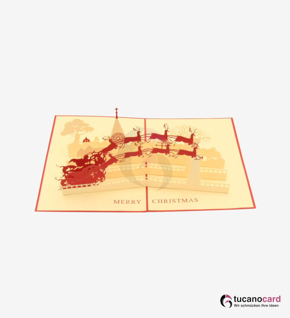 Weihnachtsmann mit Schlitten, Rentieren und Kirche - Kartenfarbe Rot - 15 x 20 cm