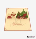 Weihnachtsmann mit Tannenbaum und Schlitten - Kartenfarbe Rot - 12 x 17 cm